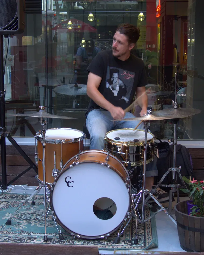 Danni Ogilvie, Gabriella Cohen, playing C&C drums