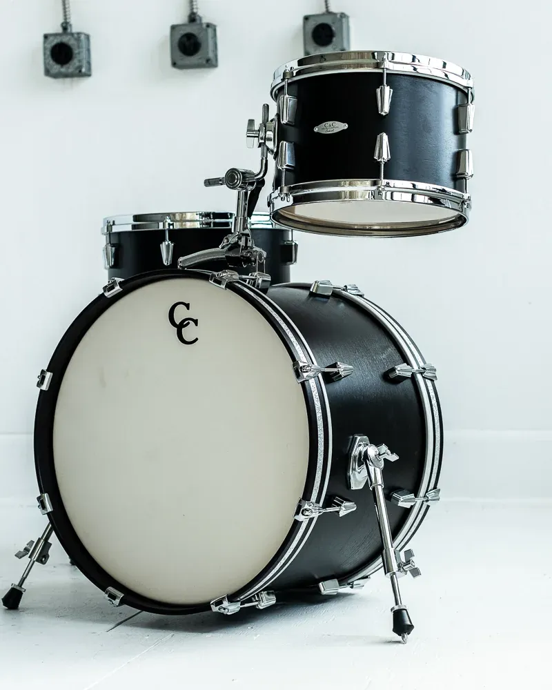 Maple Gum in Ebony with cast hoops · Bebop