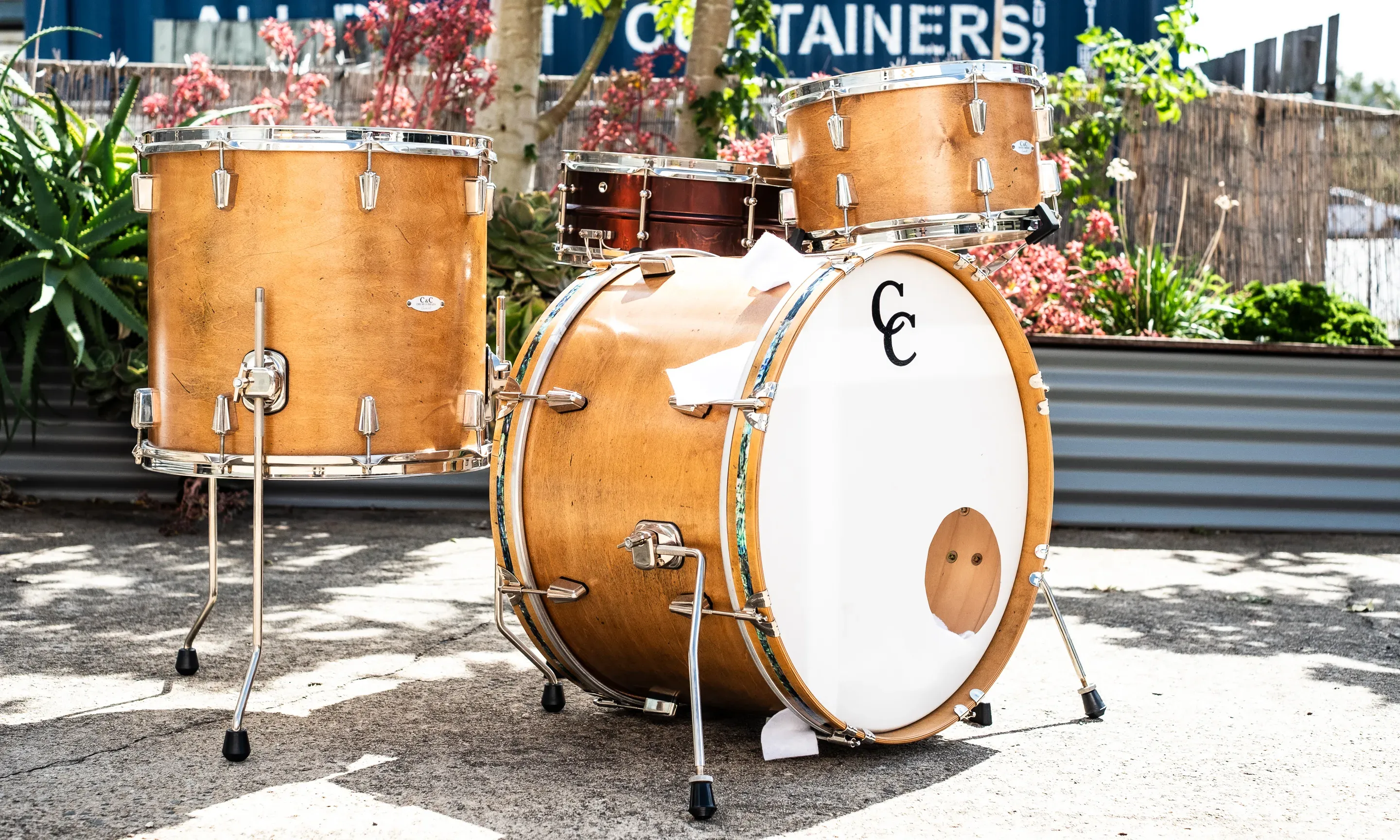 Custom kit in an amber stain with abalone inlay, shot outdoors