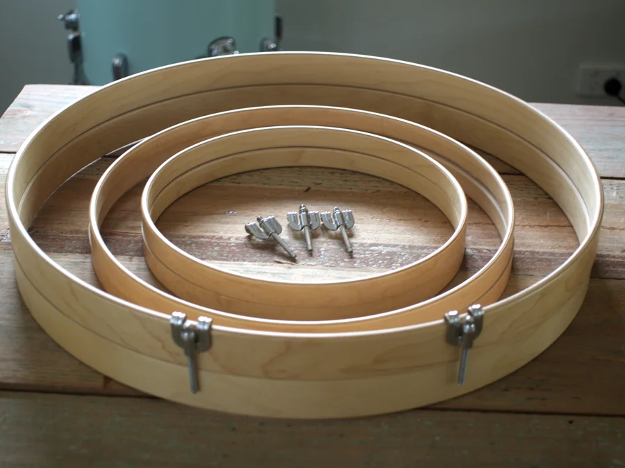 Three natural maple wood hoops with claws
